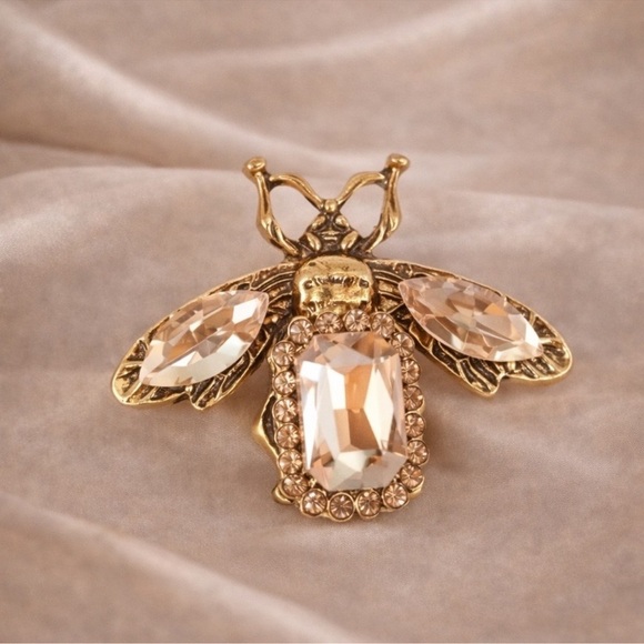 Anthropologie Jewelry - Champagne Gold Bee Brooch with Crystal Details